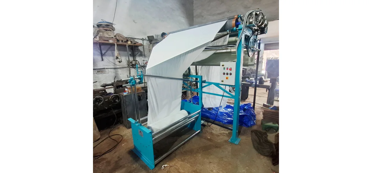 Tubular Fabric Opening and Plaiting Machine by Niruma Textile Machinery
